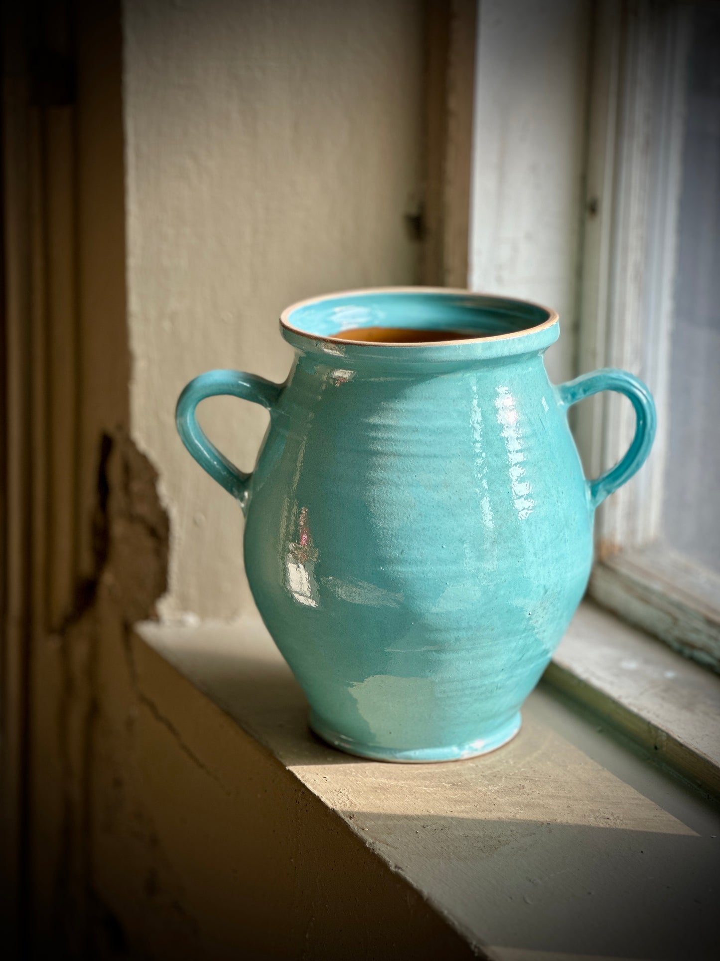 Urna, glaserad i olika färger